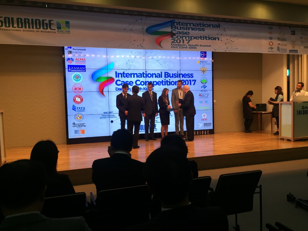 Receiving certificates at the International Business Case Competition in Daejeon