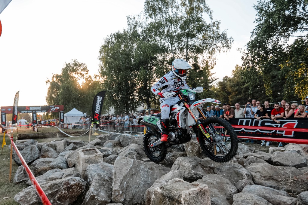 Enduro rider navigating the rock section at FIM Enduro GP Zalaegerszeg