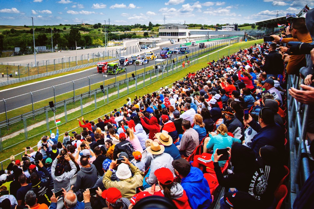Packed Hungaroring grandstand overlooking the truck race