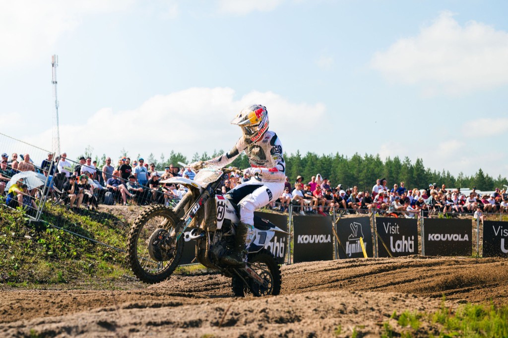 Motocross rider cresting a jump at MXGP KymiRing