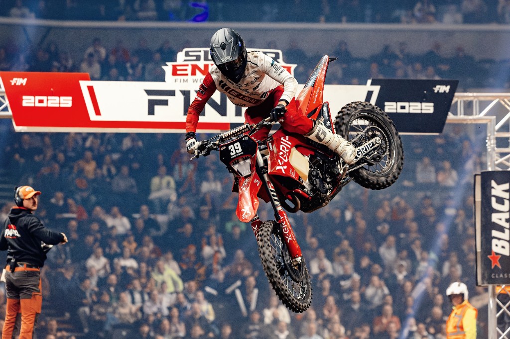 Rider mid-air over the finish banner at SuperEnduro GP of Hungary