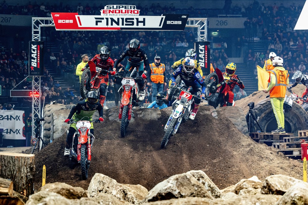 Riders attacking the rock section inside the arena