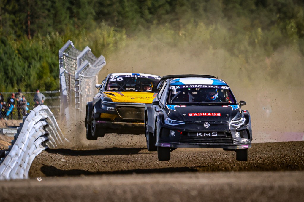 Two World RX cars airborne over a jump at KymiRing